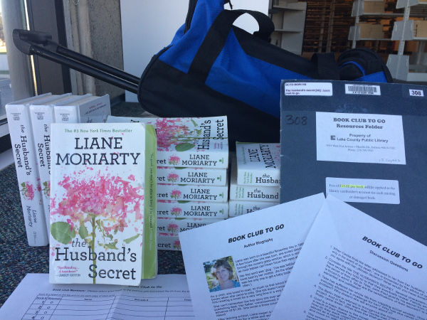 Book club to go kits contain multiple copies of the book, discussion questions, and author info, all packaged in a convenient carrything case.