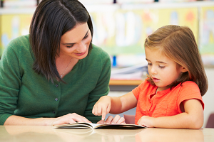 A parent and child reading together