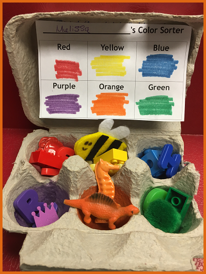 A color sorter made using an egg carton with each cell labeled with a color