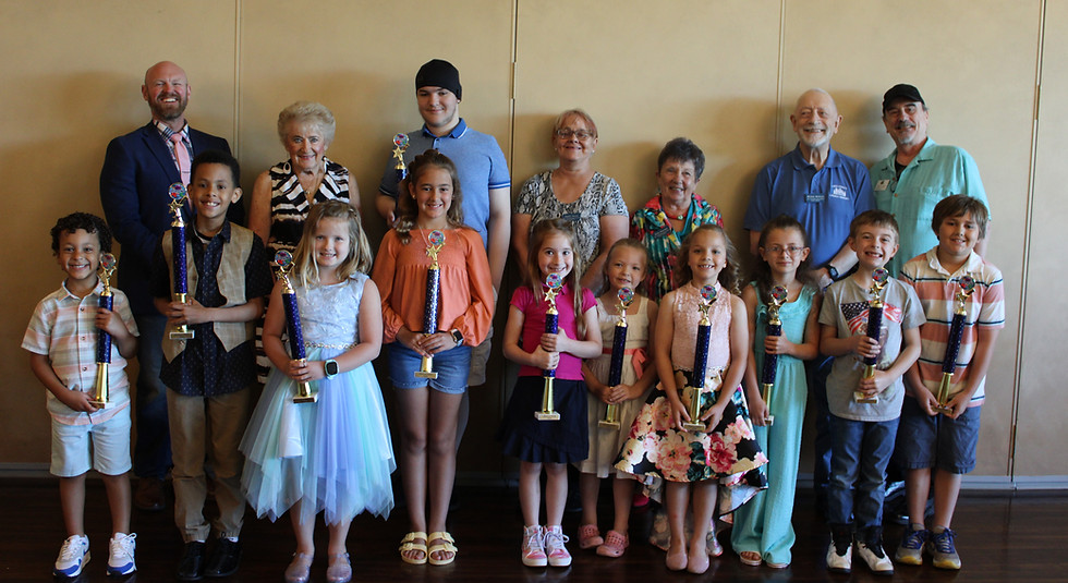 The Foundation Board poses with the annual Read a Thon winners