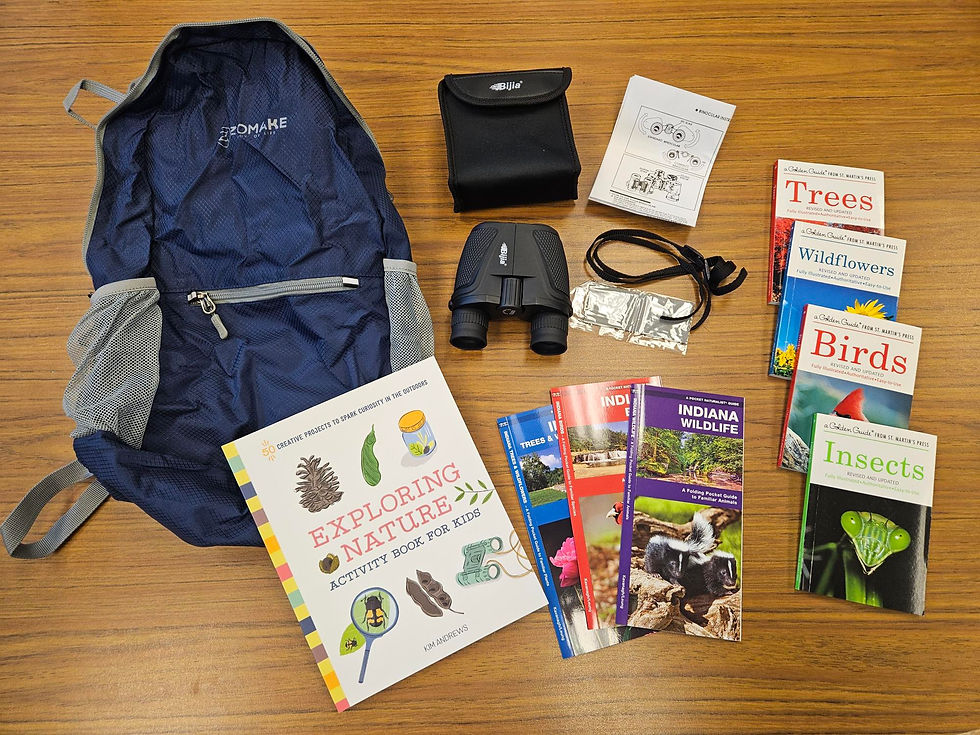 A nature walk kit including information on Indiana wildlife, binoculars, and a backpack