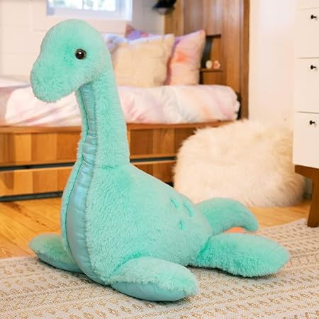 A large plush toy shaped like a lock ness monster