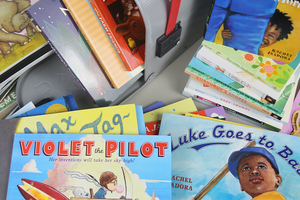 Close up of picture books surrounding a mail box
