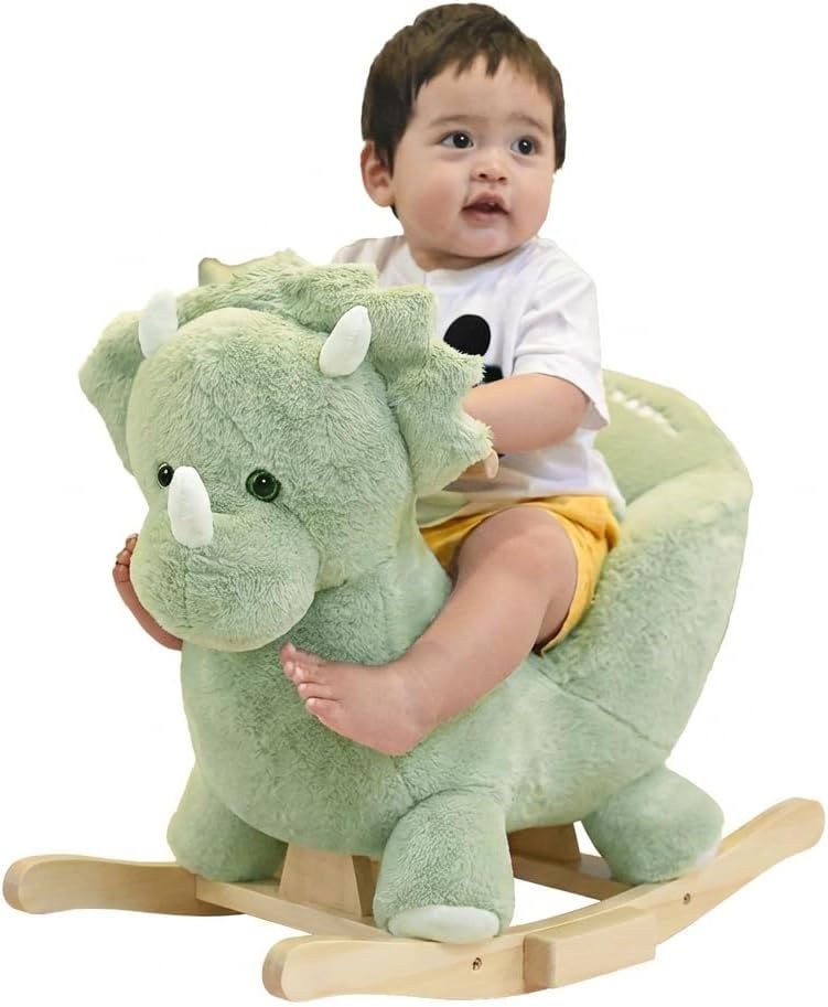 A baby on a plush dinosaur on rockers like a rocking horse